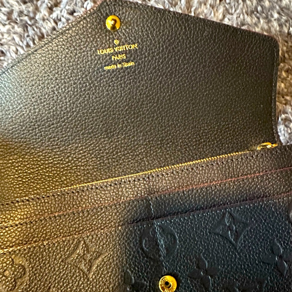 The dark blue LV impriente. Look for the bag that matches.